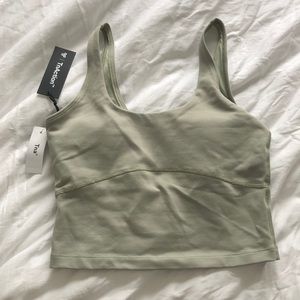 Aritzia TNA Action brand new never worn tank in silent storm green.